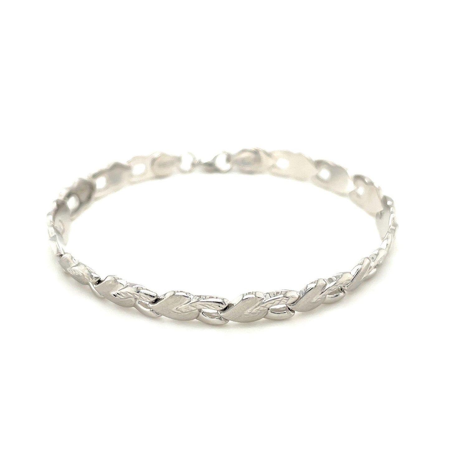Pulsera de oro blanco de 14k con forma de corazón texturizado