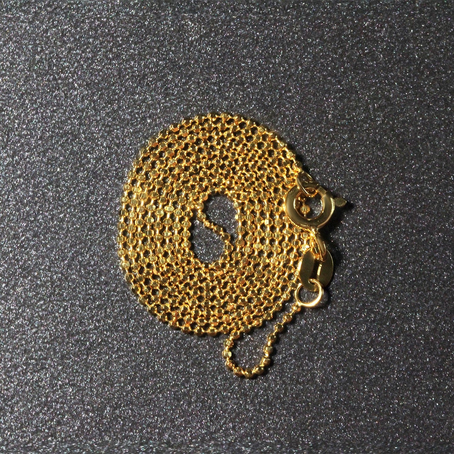 Cadena de oro amarillo de 14k de 1.0mm con cuentas facetadas