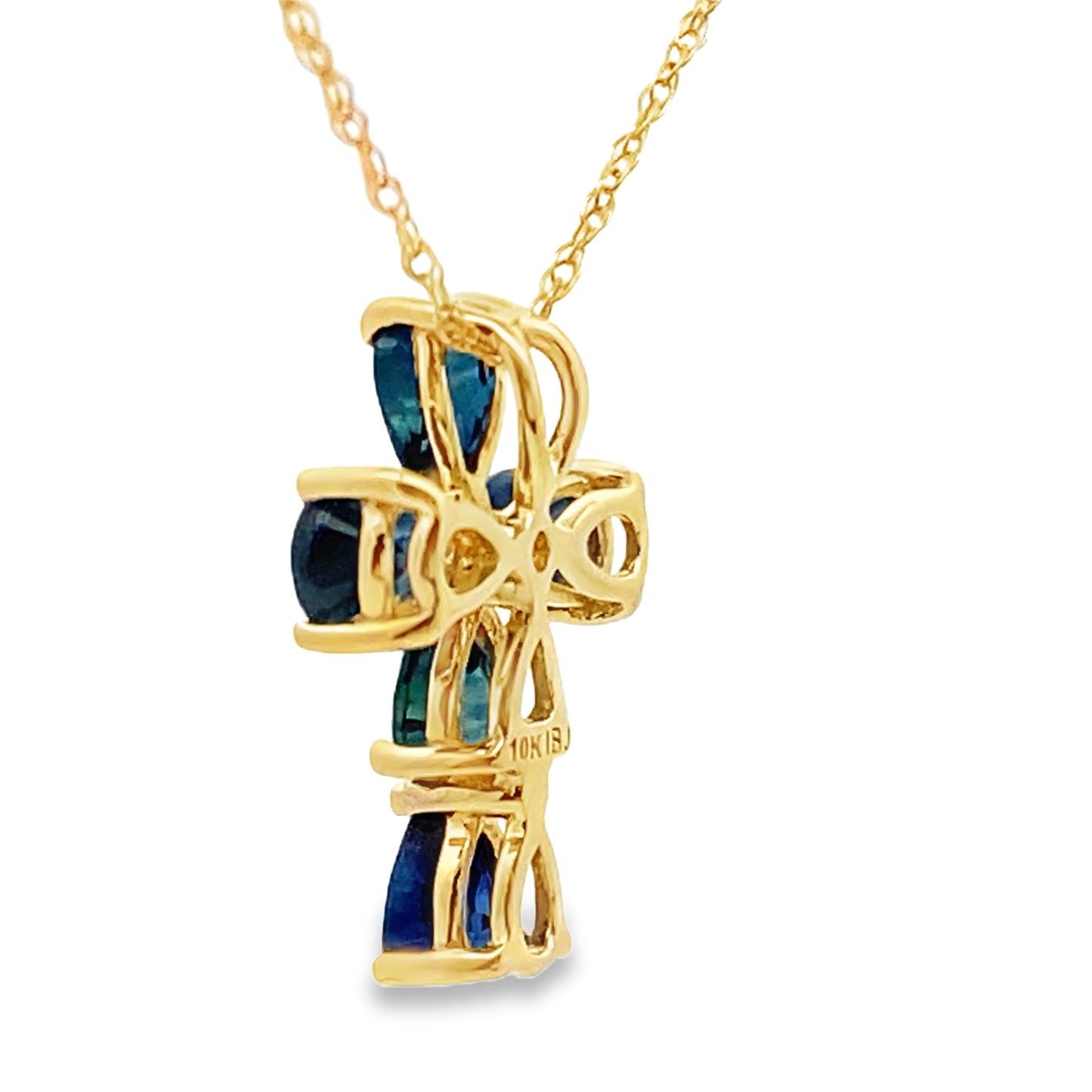 Colgante religioso de cruz con zafiro de 0,82 ct en oro amarillo de 10 kt
