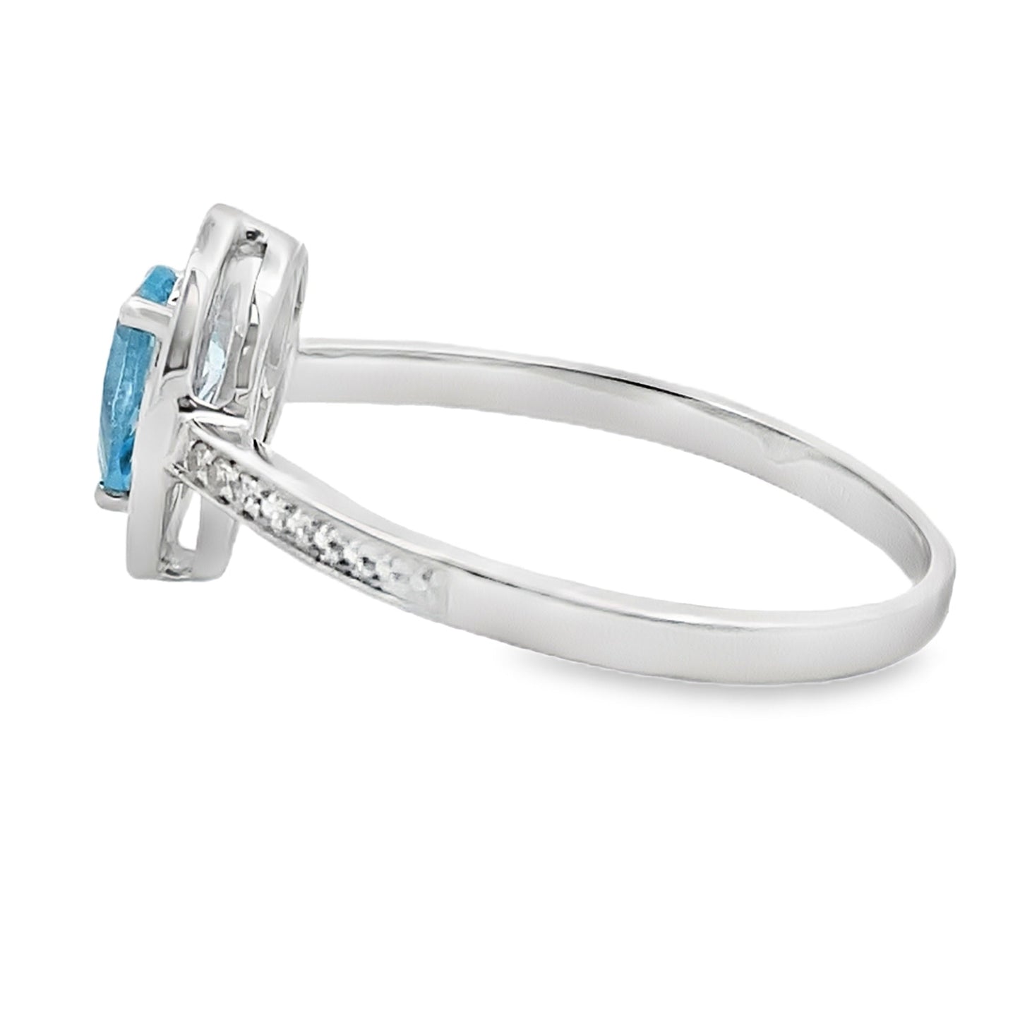 Anillo de topacio azul y diamantes de 0,54 ct en oro blanco de 10 quilates