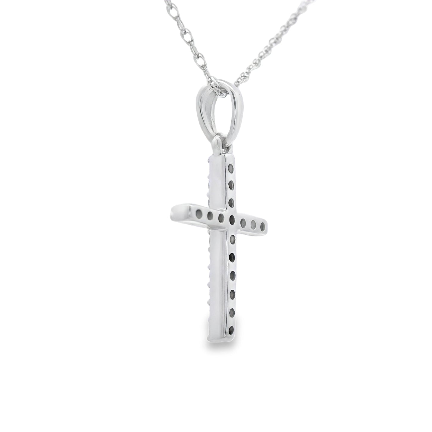 Colgante de cruz religiosa con diamante de .10 ct en oro blanco de 14 K