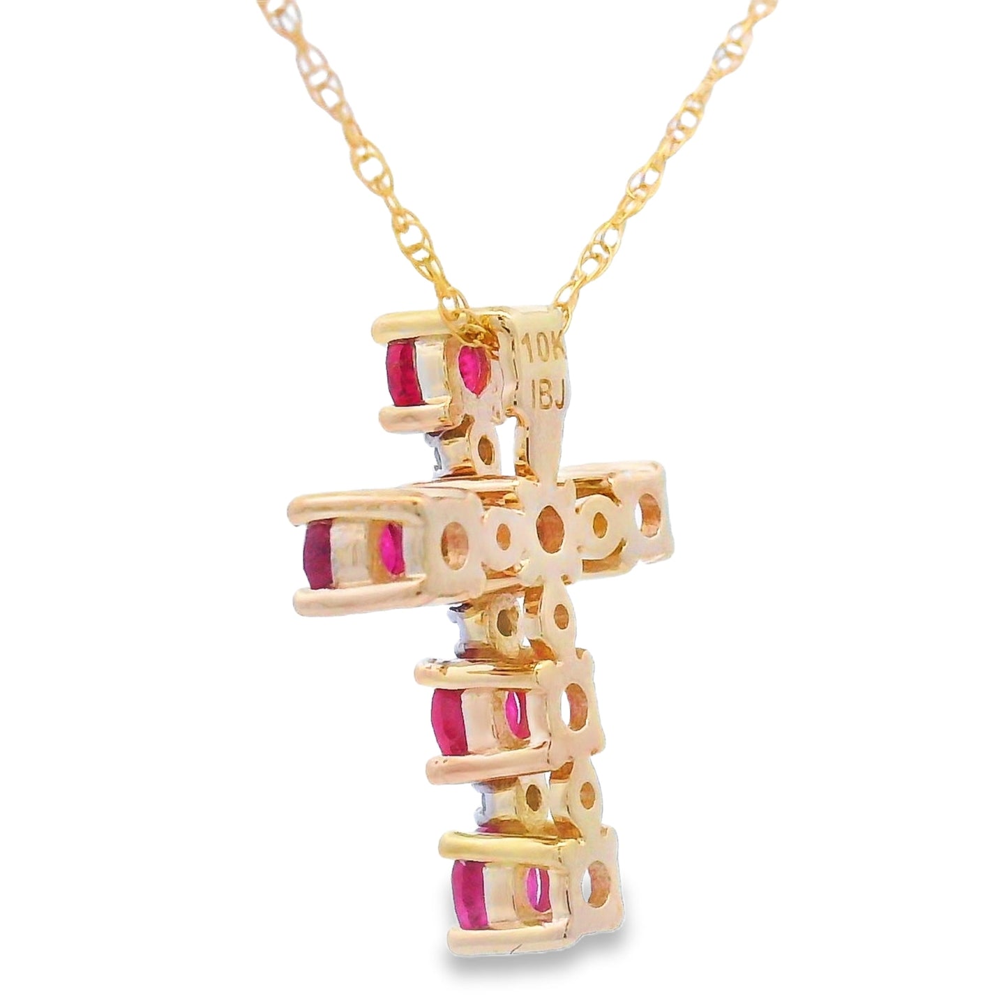 Colgante religioso de cruz con rubí y diamante en oro amarillo de 10 quilates
