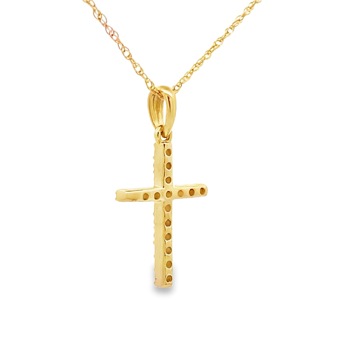 Colgante de cruz religiosa con diamante de .11 ct en oro amarillo de 14 kt