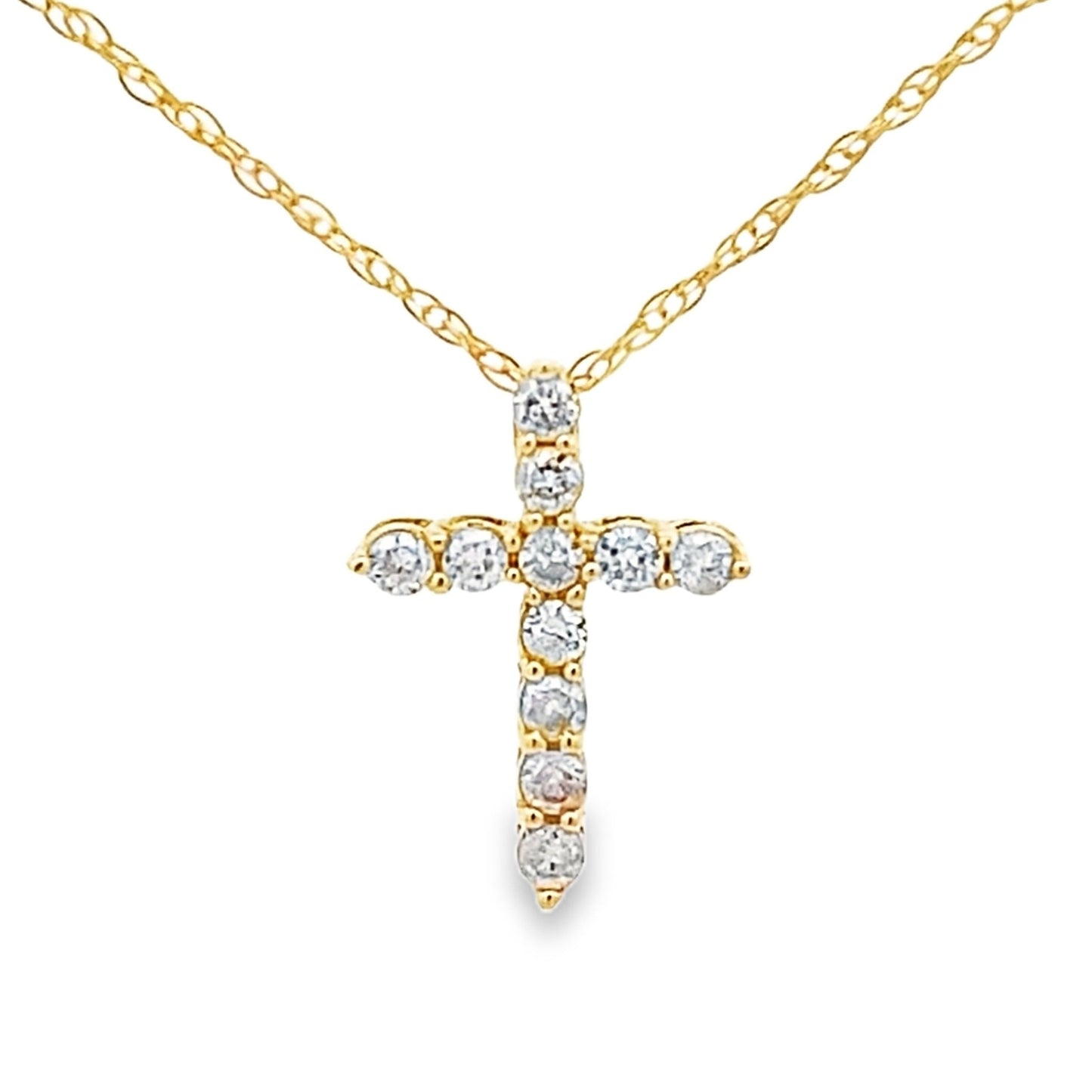 Colgante religioso de cruz con diamante de .12ct en oro amarillo de 14K