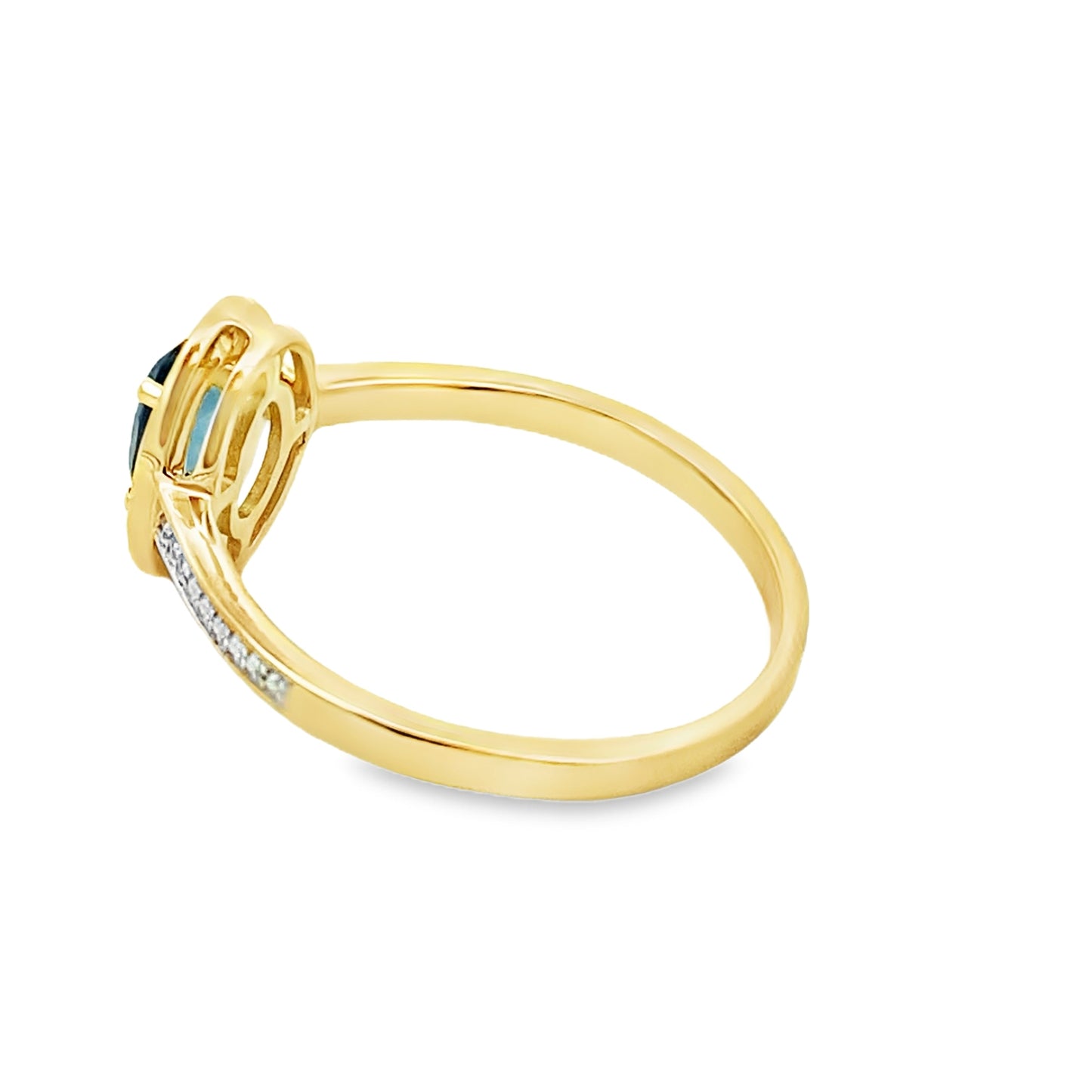 Anillo de topacio azul de Londres de 0,59 qt con diamantes en oro amarillo de 10 kt