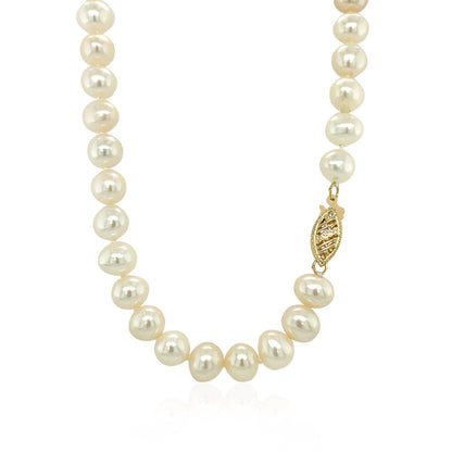 Collar de oro amarillo de 14k con perlas cultivadas de agua dulce blancas (6.0mm a 6.5mm)