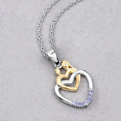 Colgante de plata de ley .925 con tanzanita genuina de 0.14 quilates