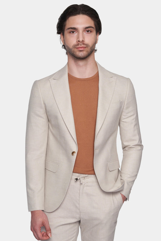 El traje a medida (beige)