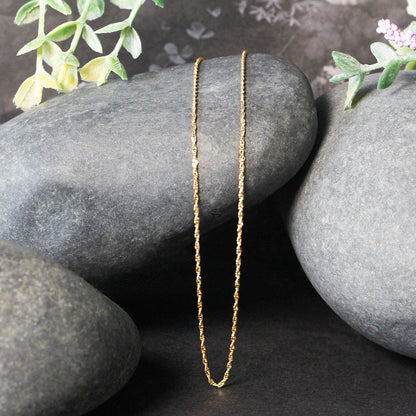 Cadena Singapur de oro amarillo de 14k y 1,0 mm