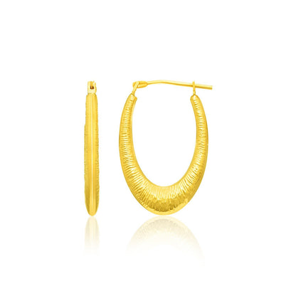 Pendientes de aro de oro amarillo de 14k con textura gradual