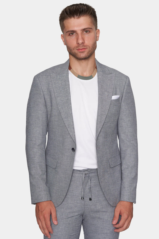 El traje a medida (gris jaspeado)