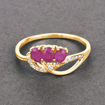 Anillo de oro amarillo de 14K con rubí genuino de 0.71 quilates y diamantes blancos