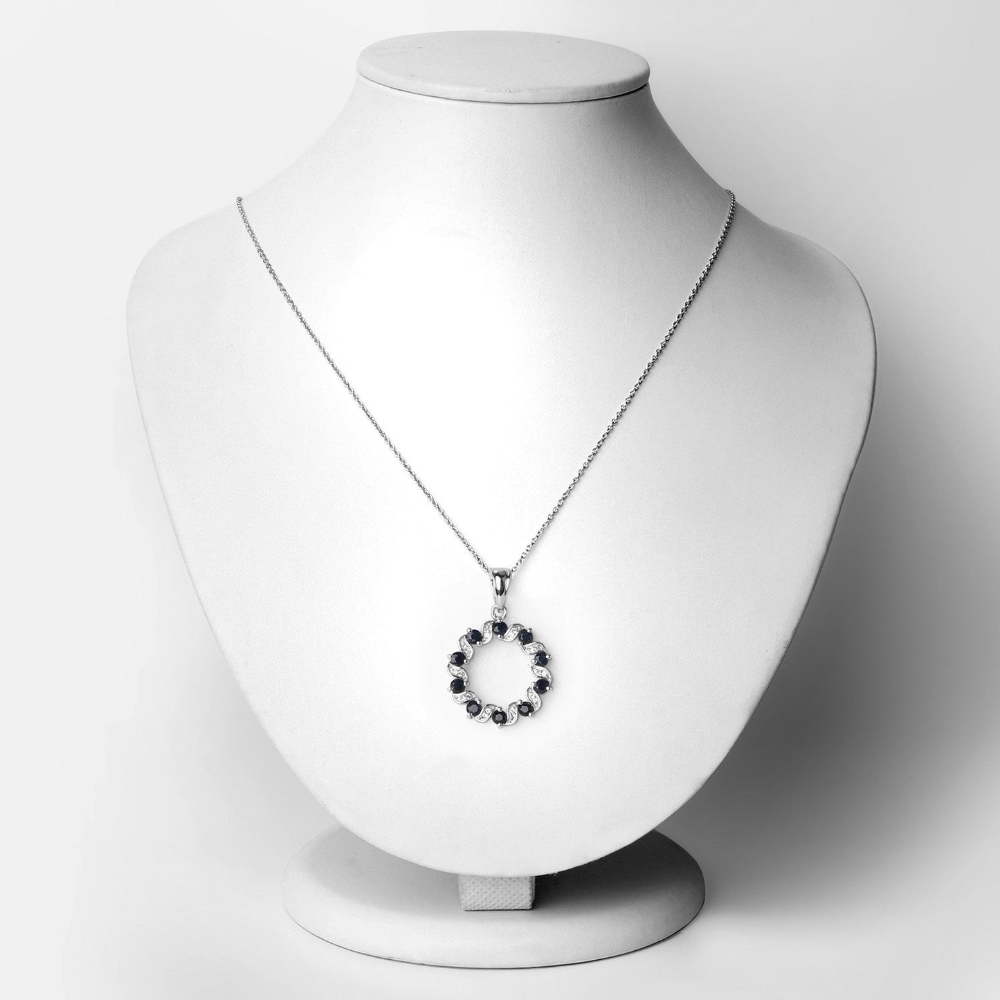 Colgante de plata de ley .925 con zafiro azul genuino de 1.30 quilates y topacio blanco