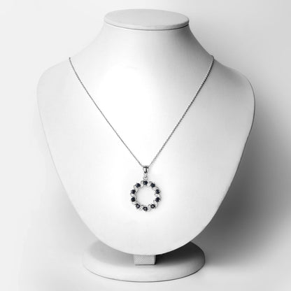 Colgante de plata de ley .925 con zafiro azul genuino de 1.30 quilates y topacio blanco