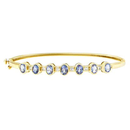 Pulsera esclava de oro amarillo de 14K con tanzanita ovalada de 5MM engastada en bisel alterno y diamantes de 1/5 Cttw (Color H-I, Claridad VS2-SI1) - Se adapta a muñecas de hasta 7.25 pulgadas