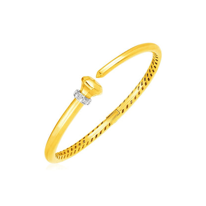 Brazalete de oro amarillo de 14 quilates con bisagras y diamantes