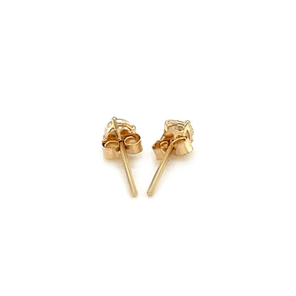 Pendientes de oro amarillo de 14k con circonita cúbica facetada de tonalidad blanca