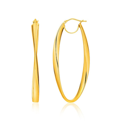 Pendientes de aro de oro amarillo de 14k con diseño de torsión en forma ovalada