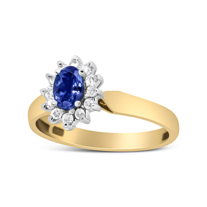 Anillo de Halo de Oro Amarillo de 14K con Diamantes Redondos de 1/5 Cttw y Tanzanita Azul Ovalada de 6x4mm (Color H-I, Claridad I1-I2) - Talla 7.75