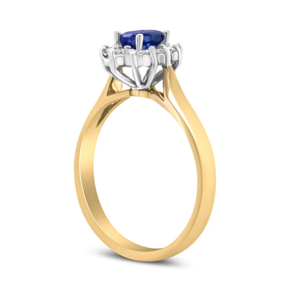 Anillo de Halo de Oro Amarillo de 14K con Diamantes Redondos de 1/5 Cttw y Tanzanita Azul Ovalada de 6x4mm (Color H-I, Claridad I1-I2) - Talla 7.75