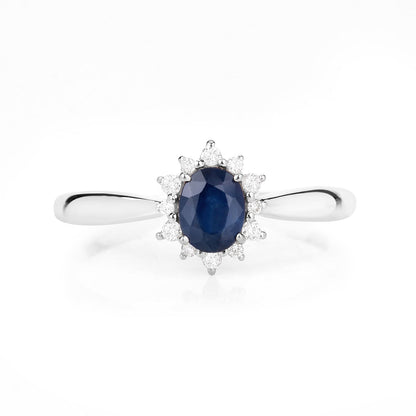 Anillo de oro blanco de 14K con zafiro azul auténtico de 0,44 quilates y diamantes blancos