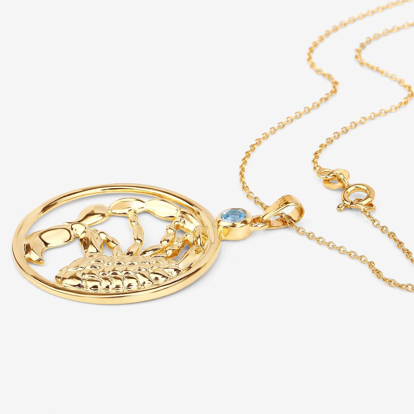 Colgante de plata de ley .925 con topacio azul auténtico de 0.32 quilates