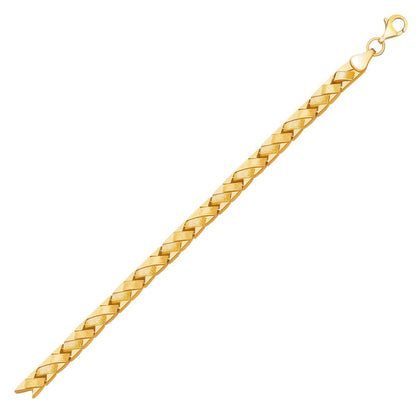 Pulsera de línea en oro amarillo de 14k con diseño de cesta elegante