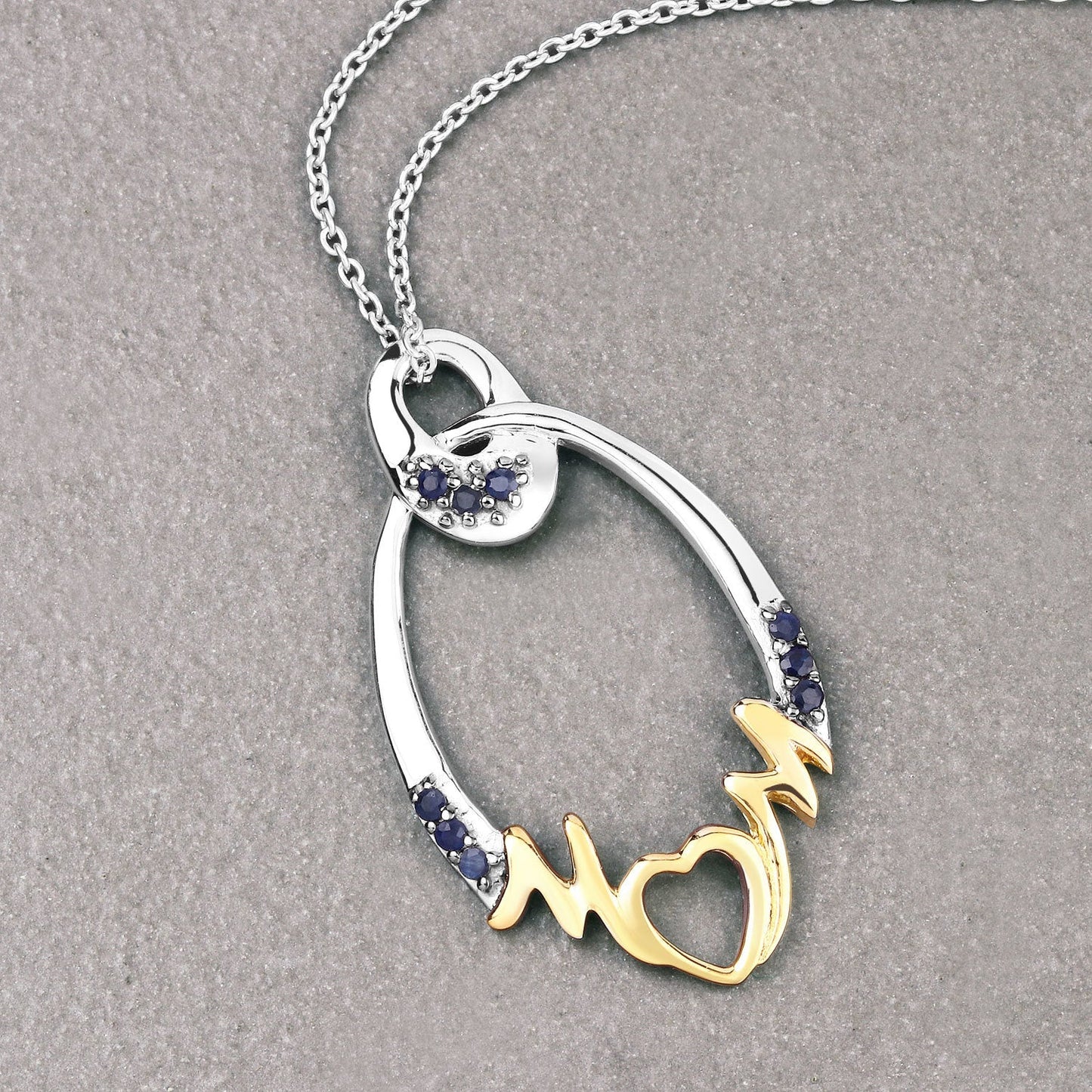 Colgante de plata de ley .925 con zafiro azul auténtico de 0.18 quilates
