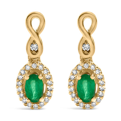 Pendientes colgantes de oro amarillo de 10K con esmeralda verde de talla ovalada de 5x3 mm y diamantes redondos de 1/7 Cttw
