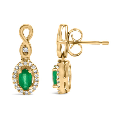 Pendientes colgantes de oro amarillo de 10K con esmeralda verde de talla ovalada de 5x3 mm y diamantes redondos de 1/7 Cttw