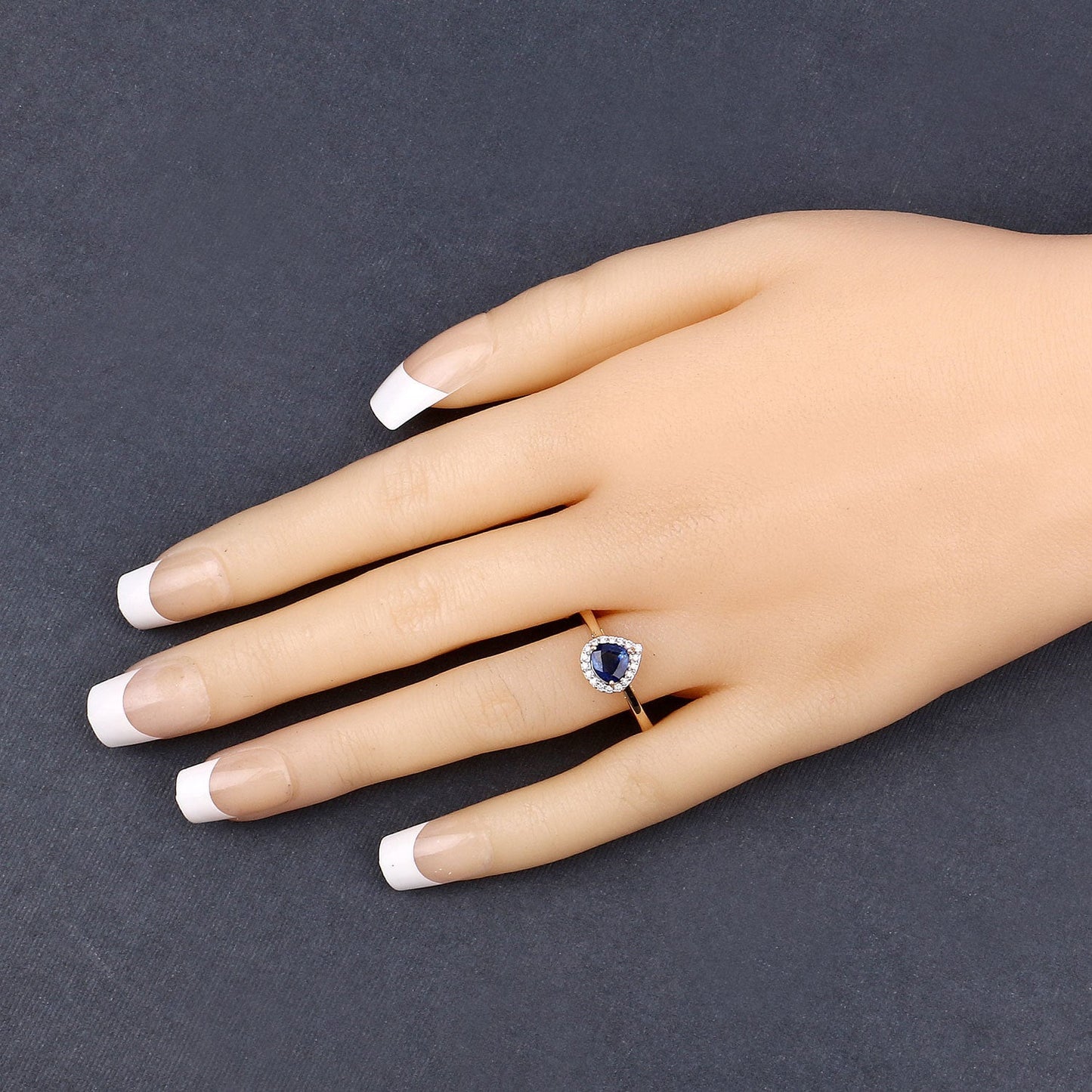 Anillo de oro amarillo de 14 quilates con zafiro azul auténtico de 0,73 quilates y diamante blanco
