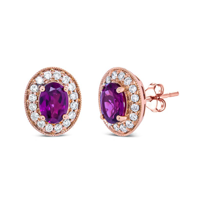Pendientes de halo de oro rosa de 14 quilates con granate talla oval de 7x5 mm y diamantes redondos de 3/8 quilates (color G-H, claridad SI1-SI2)