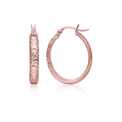 Pendientes de aro ovalados martillados de oro rosa de 14 quilates