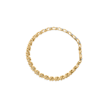 Pulsera con eslabones en "X" alternos de oro amarillo de 10 qt y 1/2 quilate total de diamante