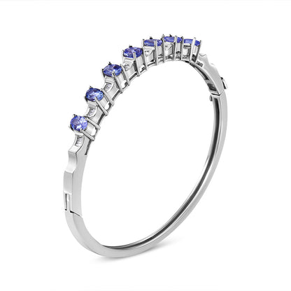 Brazalete de oro blanco de 14 quilates con tanzanita azul ovalada de 5 mm y diamantes de 1/4 Cttw (color H-I, claridad VS2-SI1) - Se ajusta a muñecas de hasta 7 1/2 pulgadas
