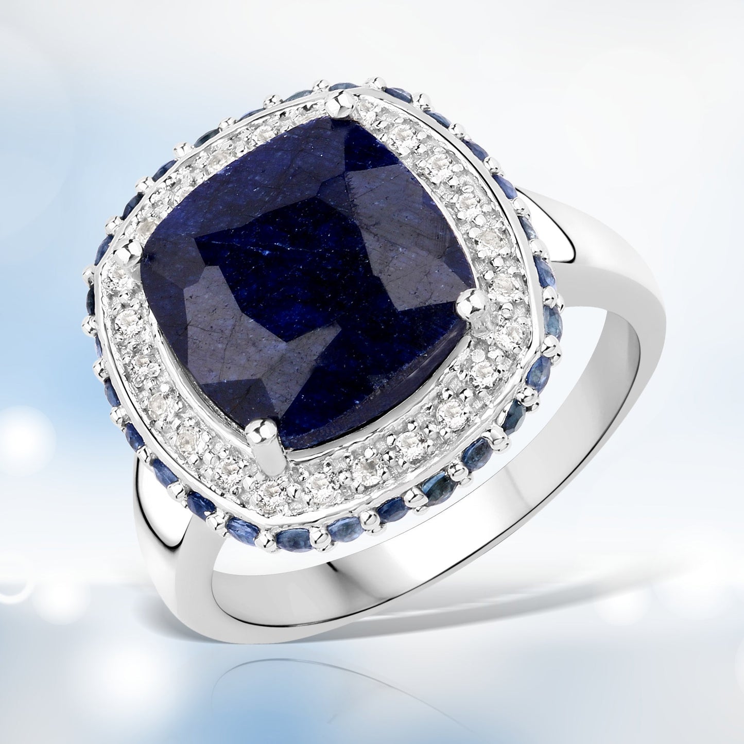 Anillo de plata esterlina .925 con zafiro teñido de 6.46 quilates, zafiro azul y topacio blanco