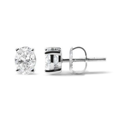 Pendientes solitario de diamante cultivado en laboratorio de oro blanco de 14K con forma ovalada de 3/4 Cttw (color F-G, claridad VS1-VS2)