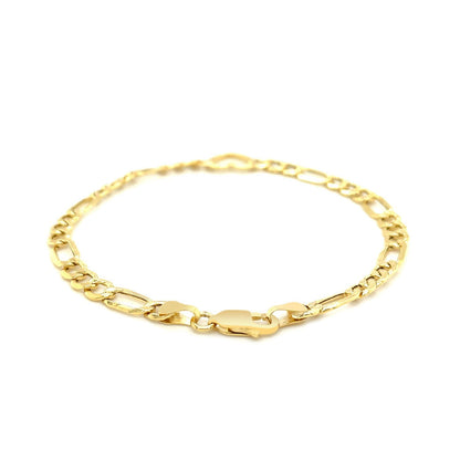 Pulsera de cadena Fígaro de oro amarillo de 14k y 7 pulgadas con corazón