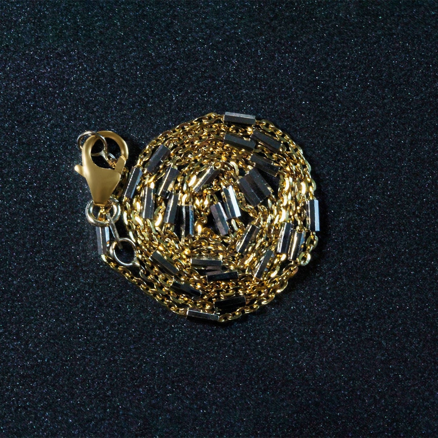 Cadena con eslabones de barra en oro bicolor de 14k (1.4mm)