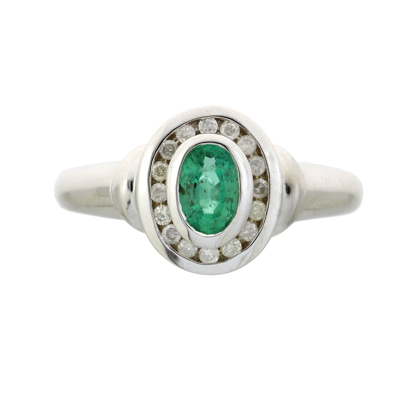 Anillo de oro blanco de 10 qt con esmeralda y diamantes de 0,60 ct
