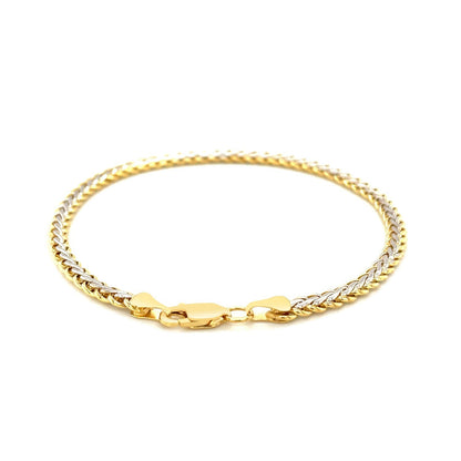 Pulsera de cadena fina de trigo bicolor en oro amarillo y blanco de 10k