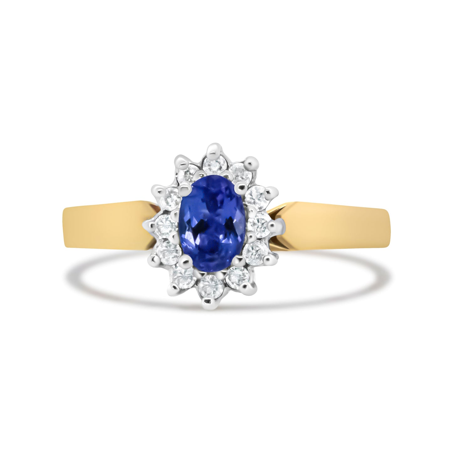 Anillo de Halo de Oro Amarillo de 14K con Diamantes Redondos de 1/5 Cttw y Tanzanita Azul Ovalada de 6x4mm (Color H-I, Claridad I1-I2) - Talla 7.75