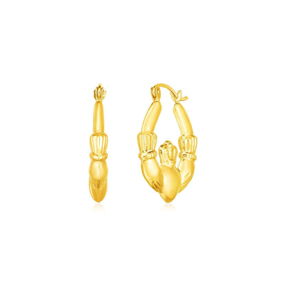 Pendientes de aro con símbolo de Claddagh de oro amarillo de 14 quilates