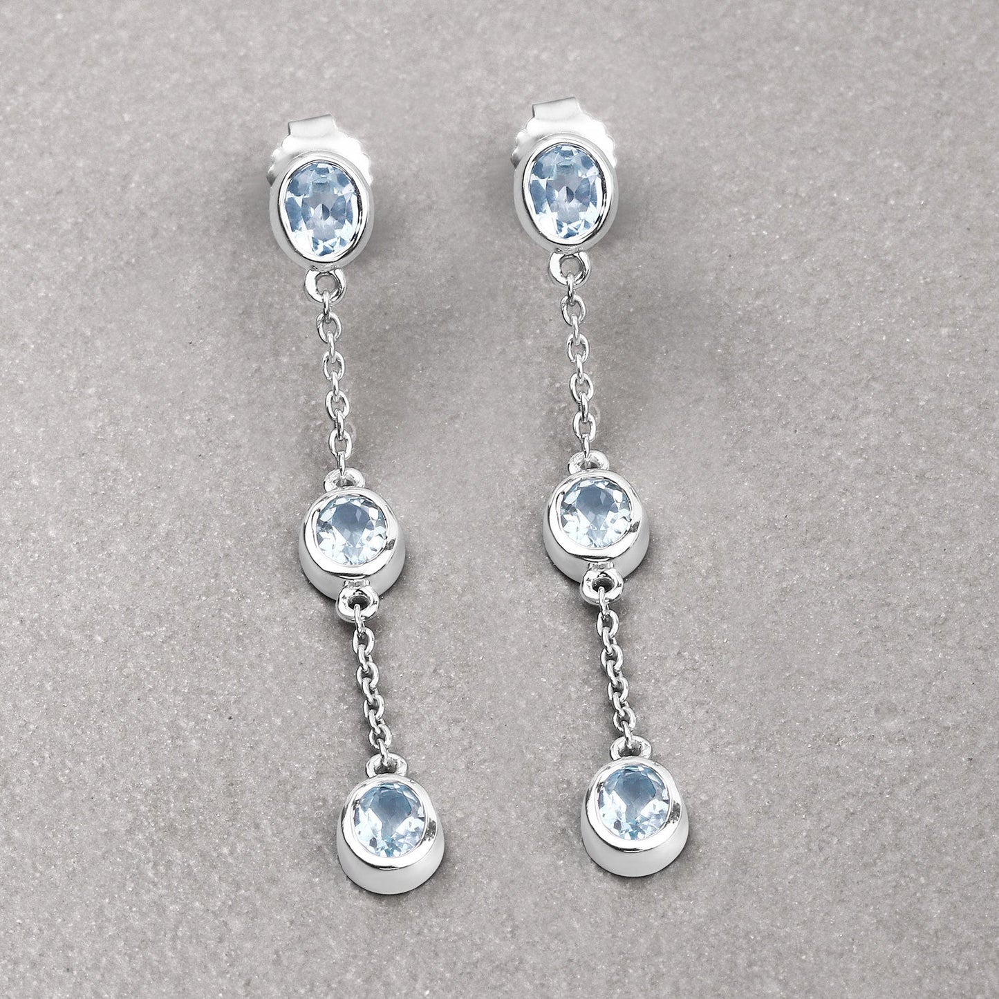 Pendientes de plata de ley .925 con topacio azul auténtico de 2,16 quilates