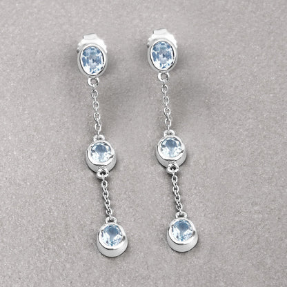Pendientes de plata de ley .925 con topacio azul auténtico de 2,16 quilates