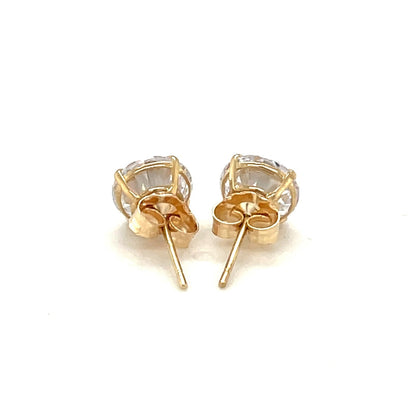 Pendientes de oro amarillo de 14k con circonita cúbica facetada de tonalidad blanca