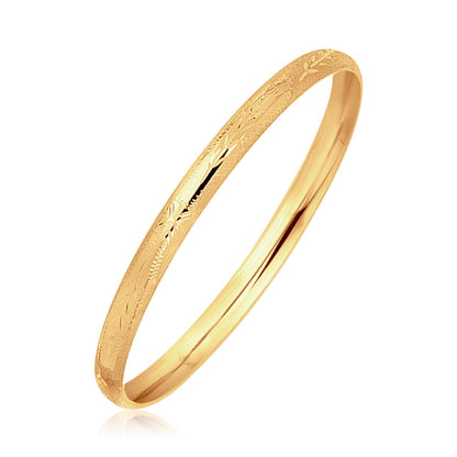 Brazalete infantil de oro amarillo de 14k estilo domo con cortes de diamante