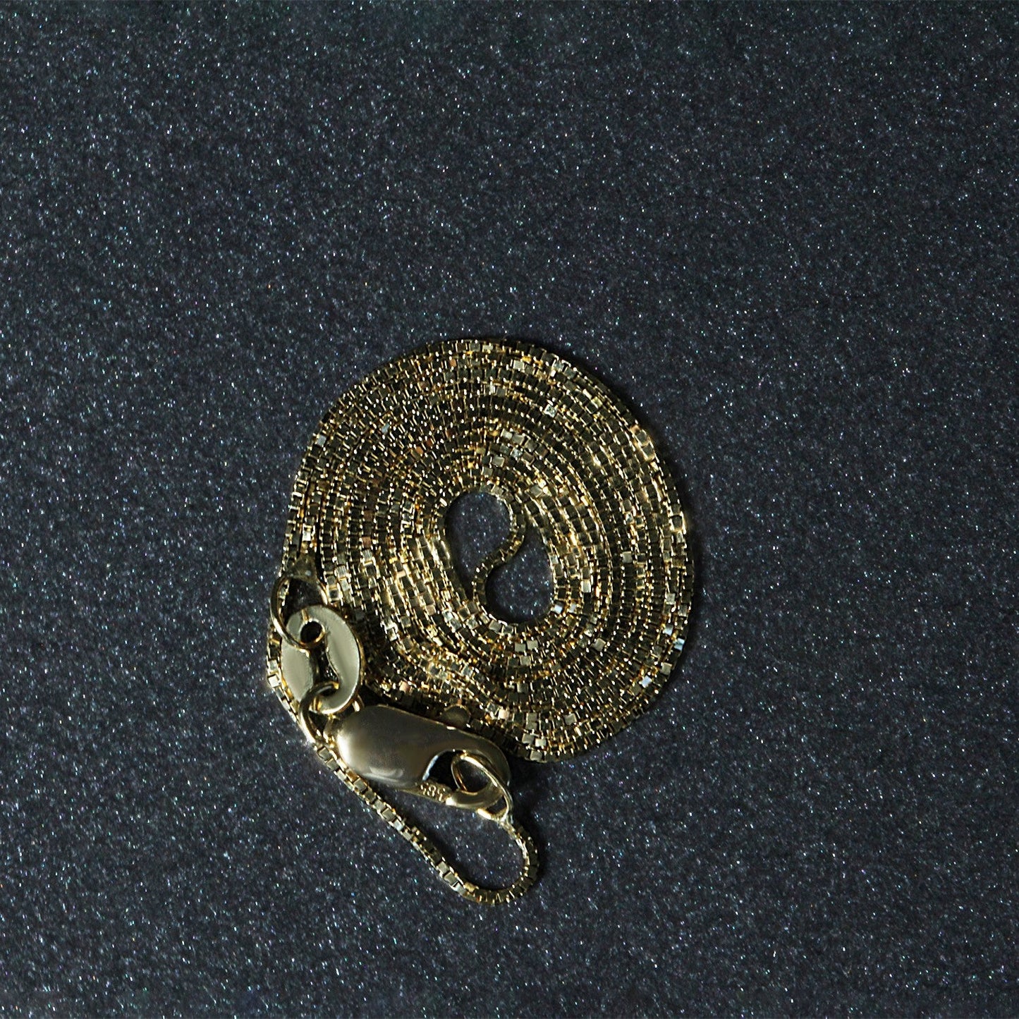 Cadena clásica de oro amarillo de 14k y 0.6mm