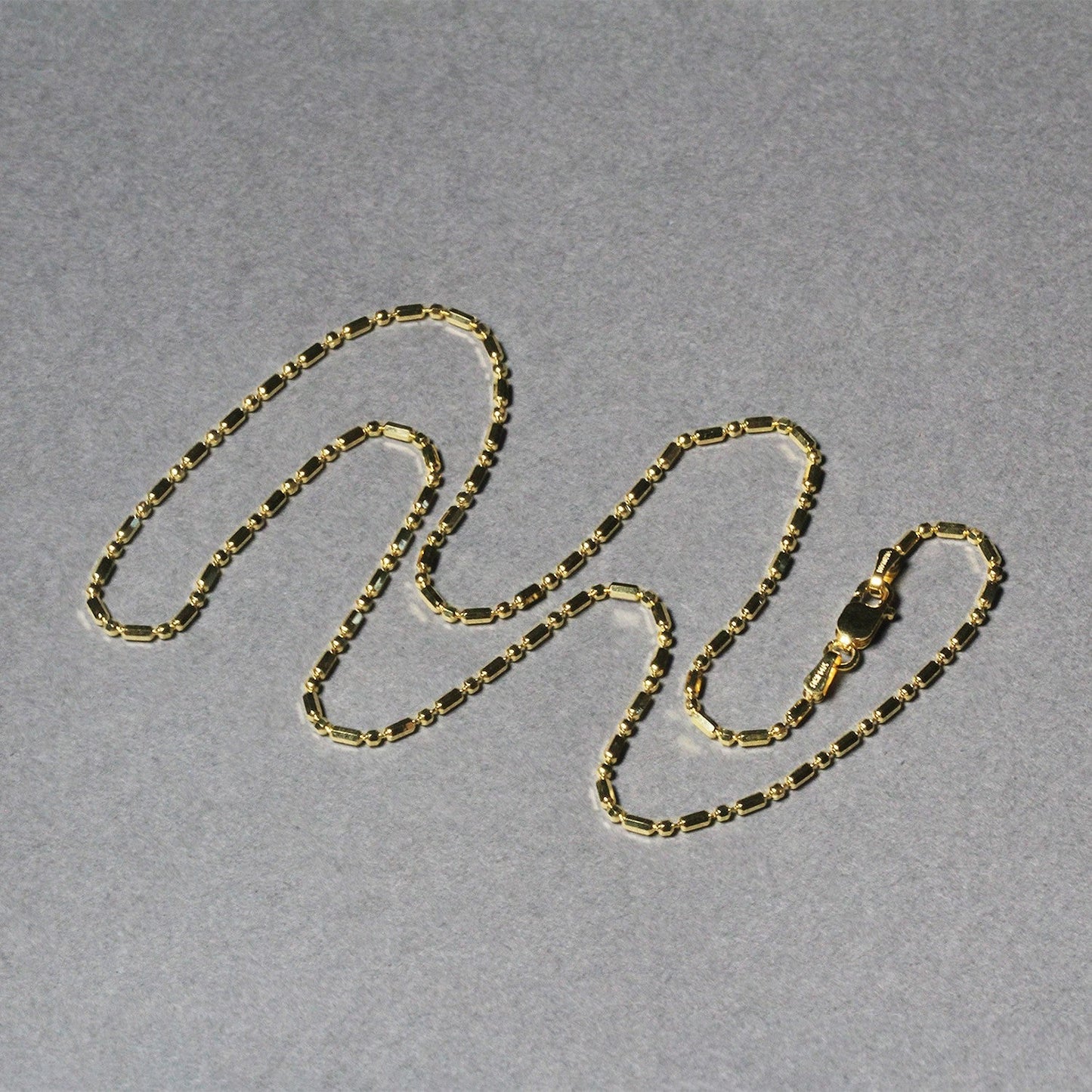 Cadena de Oro Amarillo de 14k con Cuentas Alternas Talladas con Diamante de 1.5mm
