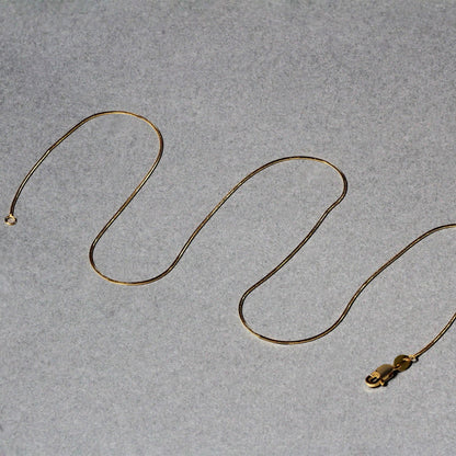 Cadena redonda de serpiente de oro amarillo de 14k de 0.7mm